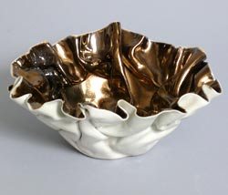 white and gold bowl